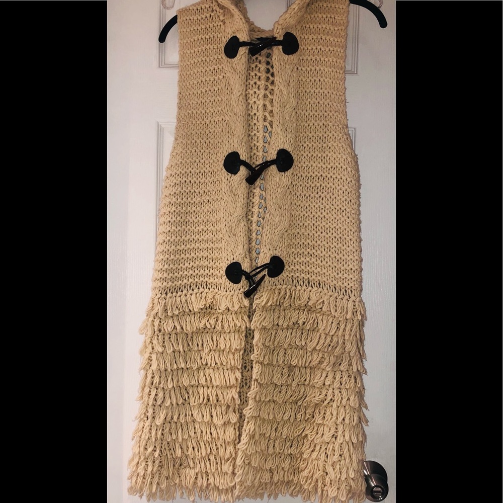 T.O.V. Knit hooded sweater vest with toggle closures and fringe detail